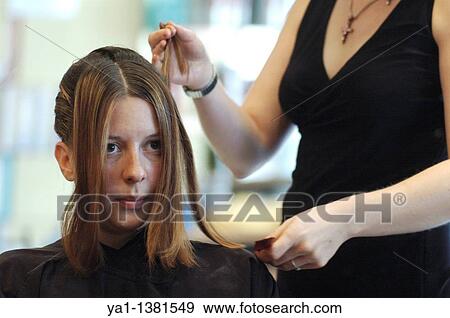 Stock Photo - French bride in preparation to the hairdresser. Fotosearch