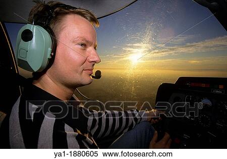 French pilot flying at dusk on a plane Robin DR400-120, France View Large Photo Image Stock Photography - French pilot flying at dusk on a plane Robin DR400-120, France. Fotosearch