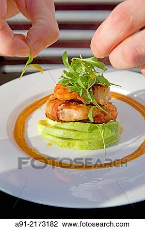 Stock Image - French Polynesia, Leeward archipelago, Bora Bora island, Luxury Hotel resort Saint-Regis, Chef Romuald Feger at restaurant Lagon by Jrean-Georges Vongerichten. Fotosearch