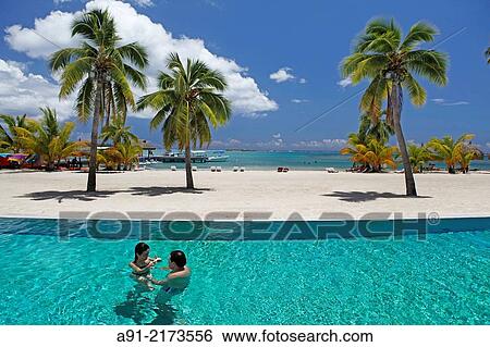 French Polynesia, leeward islands archipelago, island of Moorea, Intercontinental resort and hotel, swimming pool View Large Photo Image Stock Photograph - French Polynesia, leeward islands archipelago, island of Moorea, Intercontinental resort and hotel, swimming pool. Fotosearch
