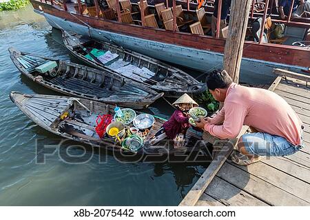 Fresh breakfast served to go at Chau Doc, Mekong River Delta, Vietnam. View Large Photo Image Stock Image - Fresh breakfast served to go at Chau Doc, Mekong River Delta, Vietnam.. Fotosearch