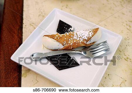 Fresh Connoli, two forks, and chocolate View Large Photo Image Stock Image - Fresh Connoli, two forks, and chocolate. Fotosearch