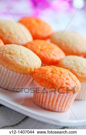 fresh cupcake with vanilla and orange View Large Photo Image Picture - fresh cupcake with vanilla and orange. Fotosearch