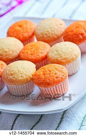 Fresh cupcake with vanilla and orange View Large Photo Image Picture - Fresh cupcake with vanilla and orange. Fotosearch