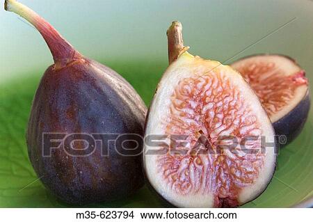 Fresh figs, whole and sliced View Large Photo Image Picture - Fresh figs, whole and sliced. Fotosearch