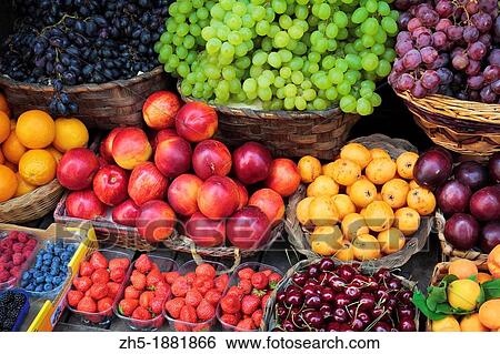 Stock Photograph - Fresh fruits and berries on display in Siena, Tuscany. Fotosearch