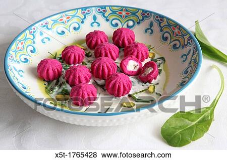 fresh red gnocchi on white background View Large Photo Image Stock Photo - fresh red gnocchi on white background. Fotosearch