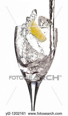 Fresh water being poured into a glass View Large Photo Image Stock Image - Fresh water being poured into a glass. Fotosearch
