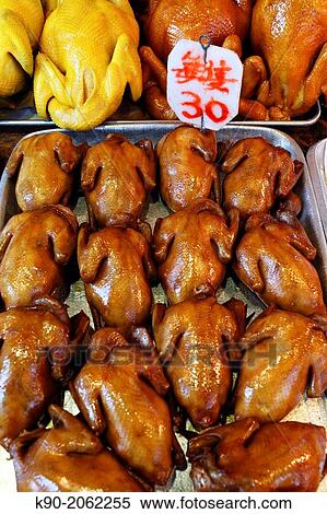 Stock Photography - Freshly grilled ducks seen from above, Hong Kong, China, East Asia.. Fotosearch