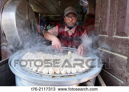 freshly steamed buffalo momos, Kathmandu, Nepal. View Large Photo Image Stock Image - freshly steamed buffalo momos, Kathmandu, Nepal.. Fotosearch