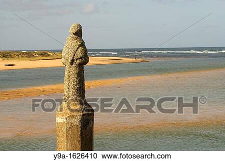 Friar statue loojing the sea, Vila Nova de Milfontes, Sudoeste Alentejano and Costa Vicentina Natural Park, Alentejo, Portugal View Large Photo Image Stock Image - Friar statue loojing the sea, Vila Nova de Milfontes, Sudoeste Alentejano and Costa Vicentina Natural Park, Alentejo, Portugal. Fotosearch