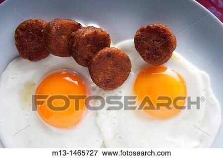 Stock Photo - Fried eggs with farinato, traditional dish of Ciudad Rodrigo. Salamanca. Castilla y Le? n. Spain. Europe. Fotosearch