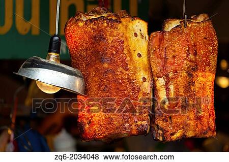 Stock Photo - Fried Meat on the Chatachuk Market in Bangkok.. Fotosearch
