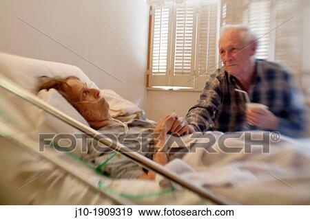friend visit elderly woman age 88, home hospice care, Poughkeepsie, NY View Large Photo Image Stock Photo - friend visit elderly woman age 88, home hospice care, Poughkeepsie, NY. Fotosearch