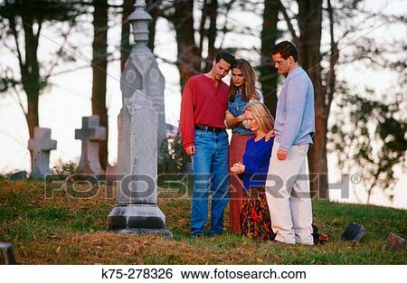 Friends at a cemetery View Large Photo Image Stock Photograph - Friends at a cemetery. Fotosearch