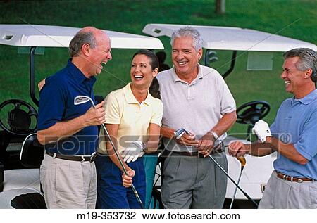 Stock Image - Friends at golf course. Fotosearch