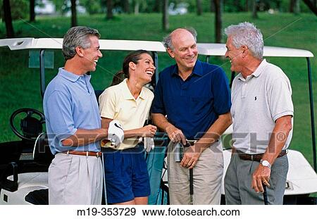 Friends at golf course View Large Photo Image Stock Photo - Friends at golf course. Fotosearch
