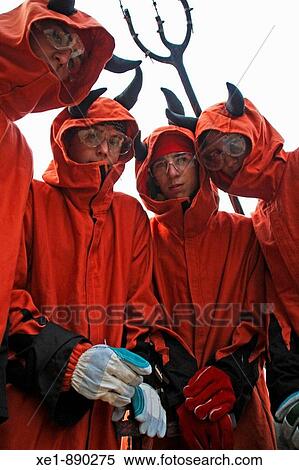Friends dressed as devils at? correfoc? festival. Festes de la Sagrada Familia, Barcelona province, Catalonia, Spain View Large Photo Image Stock Photography - Friends dressed as devils at? correfoc? festival. Festes de la Sagrada Familia, Barcelona province, Catalonia, Spain. Fotosearch