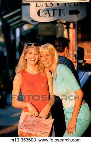 Friends go shopping View Large Photo Image Stock Image - Friends go shopping. Fotosearch
