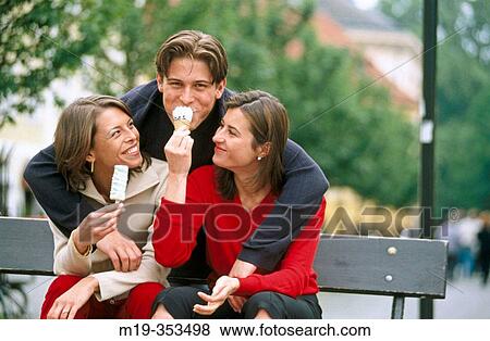 Friends having an ice-cream View Large Photo Image Stock Photo - Friends having an ice-cream. Fotosearch
