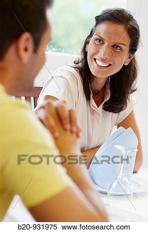 Friends in a restaurant View Large Photo Image Stock Photography - Friends in a restaurant. Fotosearch