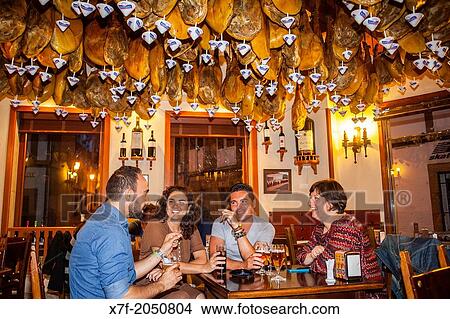 Friends in La Leonesa, calle Santo Domingo 2, Corua city, Galicia, Spain. View Large Photo Image Picture - Friends in La Leonesa, calle Santo Domingo 2, Corua city, Galicia, Spain.. Fotosearch