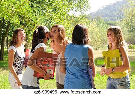 Stock Photograph - friends in the park. Fotosearch