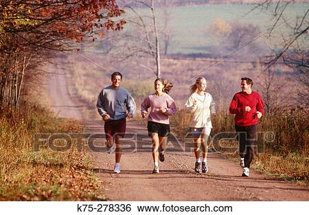 Friends jogging in the country View Large Photo Image Stock Photograph - Friends jogging in the country. Fotosearch