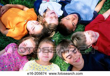 friends lying down View Large Photo Image Picture - friends lying down. Fotosearch