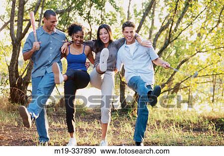 friends outdoors enjoying life View Large Photo Image Stock Image - friends outdoors enjoying life. Fotosearch