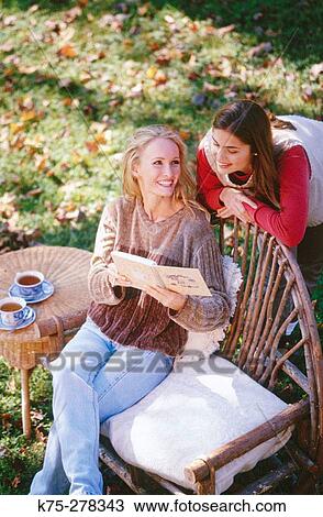 friends sharing a moment View Large Photo Image Stock Image - friends sharing a moment. Fotosearch