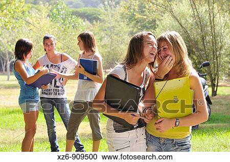 friends sharing secrets on campus View Large Photo Image Stock Image - friends sharing secrets on campus. Fotosearch