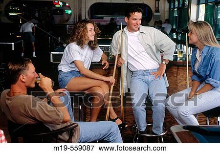 friends shooting pool View Large Photo Image Stock Photo - friends shooting pool. Fotosearch