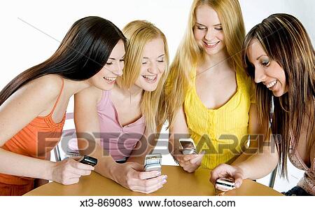 friends with mobile phones View Large Photo Image Stock Image - friends with mobile phones. Fotosearch