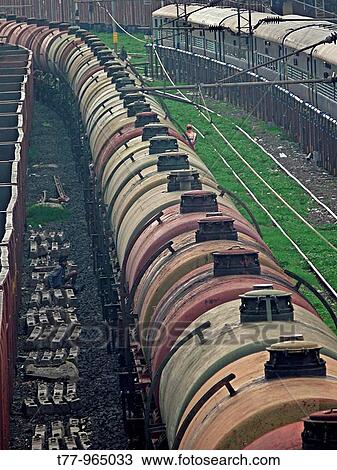 Fright car is passing on railway track, Bhopal, Madhyapradesh, India View Large Photo Image Stock Image - Fright car is passing on railway track, Bhopal, Madhyapradesh, India. Fotosearch