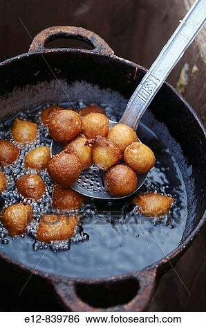 Fritters in the market, Atar. Adrar Plateau, Sahara Desert, Mauritania View Large Photo Image Stock Photograph - Fritters in the market, Atar. Adrar Plateau, Sahara Desert, Mauritania. Fotosearch