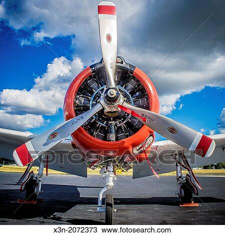Front of small Airplane showing bright, dramatic colors and deep blue cloudy sky. Easton Maryland USA View Large Photo Image Stock Image - Front of small Airplane showing bright, dramatic colors and deep blue cloudy sky. Easton Maryland USA. Fotosearch
