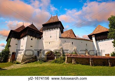Front view of the Szekly medieval fortified church of Viscri, Bunesti, Brasov, Transylvania. Started in the 1100? s. UNESCO World Heritage Site View Large Photo Image Stock Photograph - Front view of the Szekly medieval fortified church of Viscri, Bunesti, Brasov, Transylvania. Started in the 1100? s. UNESCO World Heritage Site. Fotosearch