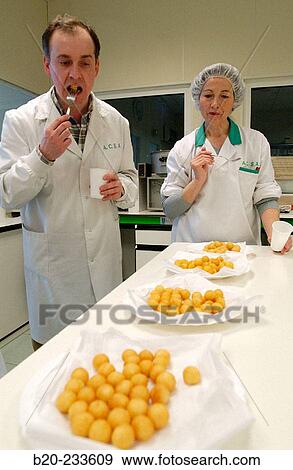 Frozen food industry, food tasters tasting potato balls of rival firms. Navarre. Spain View Large Photo Image Stock Photo - Frozen food industry, food tasters tasting potato balls of rival firms. Navarre. Spain. Fotosearch