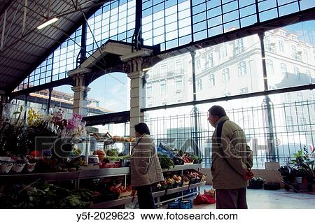 Stock Image - Fruit and vegetable stand at Lisbon's RIbeira Market.. Fotosearch