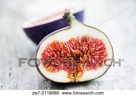 Fruit, Figs halved showing flesh and seeds. View Large Photo Image Stock Photograph - Fruit, Figs halved showing flesh and seeds.. Fotosearch