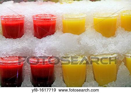 Stock Photo - Fruit juices, La Boquer? a Market, Barcelona, Catalonia, Spain. Fotosearch