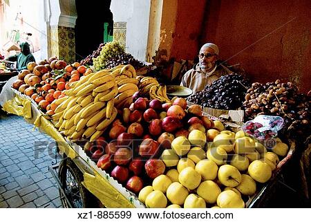 Stock Photo - Fruit stall in the souk, Marrakech, Morocco. Fotosearch