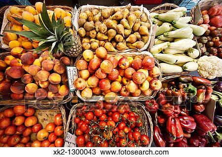 Stock Image - Fruits and vegetables for sale in market.. Fotosearch