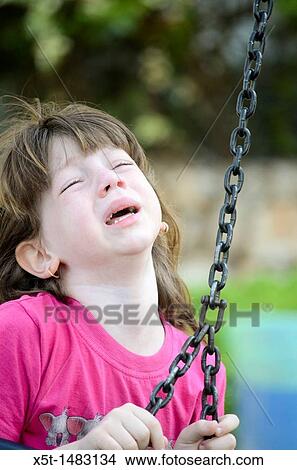 Frustrated Young girl of 6 outdoors View Large Photo Image Picture - Frustrated Young girl of 6 outdoors. Fotosearch