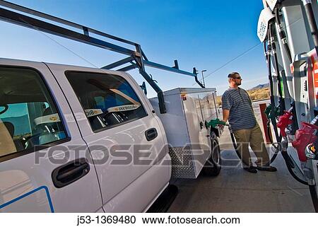 Fueling work truck with biodiesel at retail fuel station, Minden Nevada View Large Photo Image Stock Image - Fueling work truck with biodiesel at retail fuel station, Minden Nevada. Fotosearch