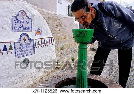 Fuente de la Amapola source of opium Fountain at Verea de Enmedio In Sacromonte troglodyte quarter Gipsy quarter, Granada, Andalusia, Spain, Europe View Large Photo Image Stock Photograph - Fuente de la Amapola source of opium Fountain at Verea de Enmedio In Sacromonte troglodyte quarter Gipsy quarter, Granada, Andalusia, Spain, Europe. Fotosearch