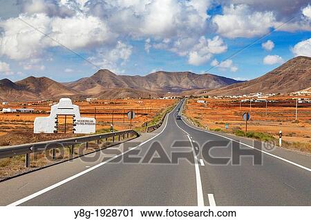 Stock Image - Fuerteventura Island landscape, road to Moro de la Atalaya, Canary Islands, Spain. Fotosearch