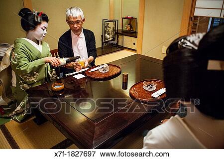 Fukukimi,?maiko? geisha apprentice workimg in Miyaki tea house o-chaia Geisha's distric of Miyagawacho Kyoto Kansai, Japan View Large Photo Image Stock Photo - Fukukimi,?maiko? geisha apprentice workimg in Miyaki tea house o-chaia Geisha's distric of Miyagawacho Kyoto Kansai, Japan. Fotosearch