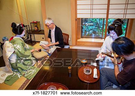 Fukuyu, geisha and Fukukimi,?maiko? geisha apprentice workimg in Miyaki tea house o-chaia Geisha's distric of Miyagawacho Kyoto Kansai, Japan View Large Photo Image Stock Image - Fukuyu, geisha and Fukukimi,?maiko? geisha apprentice workimg in Miyaki tea house o-chaia Geisha's distric of Miyagawacho Kyoto Kansai, Japan. Fotosearch